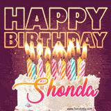 A colorful birthday cake topped with lit candles, with the words 'Happy Birthday Shonda' in bold glowing letters on a burgundy background. Animated flames add a festive touch.