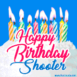 A cheerful animated GIF featuring colorful lit birthday candles on a white cake, with the text 'Happy Birthday Shooter' in bold red and blue script on a bright blue background.