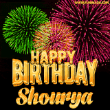 A captivating GIF with bursts of green, pink, and orange fireworks lighting up the night sky, accompanied by 'Happy Birthday Shourya' in glowing golden text.