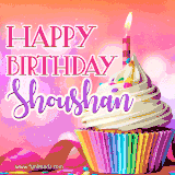 A vibrant birthday GIF featuring a rainbow-colored cupcake topped with white frosting, sprinkles, and a lit candle. The text reads 'Happy Birthday Shoushan' in bold pink and violet letters with white outline.