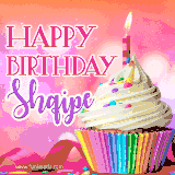 A vibrant birthday GIF featuring a rainbow-colored cupcake topped with white frosting, sprinkles, and a lit candle. The text reads 'Happy Birthday Shqipe' in bold pink and violet letters with white outline.