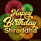 Golden text reading 'Happy Birthday Shraddha' surrounded by vibrant fireworks in red, green, and yellow, set against a dark background in this celebratory birthday GIF.