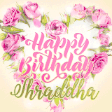 A stunning heart made of pink roses surrounds the elegant script text 'Happy Birthday Shraddha' on a soft beige background. Animated sparkles add a magical and festive feel.