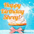 A cheerful animated GIF of a cupcake with creamy frosting, a red checkered ribbon, and a bright sparkler on top. The text 'Happy Birthday Shrey!' is displayed in vibrant orange and red.