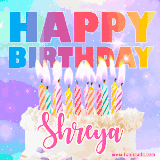A vibrant animated name GIF with the words 'Happy Birthday Shreya' with colorful candles on a creamy cake. The background sparkles with pastel shades, adding a festive touch.