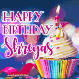 A festive animated GIF featuring a colorful cupcake with a single lit candle, sprinkles, and 'Happy Birthday Shreyas' text against a sparkling, celebratory background.