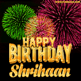 A captivating GIF with bursts of green, pink, and orange fireworks lighting up the night sky, accompanied by 'Happy Birthday Shrihaan' in glowing golden text.