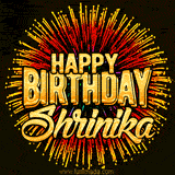 Golden 'Happy Birthday Shrinika' text accompanied by animated rainbow fireworks for a festive animated greeting.