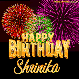 A golden 'Happy Birthday Shrinika' message with vibrant fireworks in the background, creating a festive and celebratory vibe in this animated name GIF.