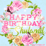 A charming animated GIF featuring 'Happy Birthday Shulamit' in pink and green text, surrounded by delicate roses, leaves, and fluttering butterflies on a soft light blue pastel background.