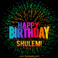 A colorful animated GIF featuring the text 'Happy Birthday Shulem!' in rainbow colors with a dynamic iridescent firework display in the background.