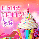 A vibrant birthday GIF featuring a rainbow-colored cupcake topped with white frosting, sprinkles, and a lit candle. The text reads 'Happy Birthday Siri' in bold pink and violet letters with white outline.