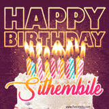 A colorful birthday cake topped with lit candles, with the words 'Happy Birthday Sithembile' in bold glowing letters on a burgundy background. Animated flames add a festive touch.