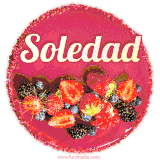 Beautifully decorated red velvet berry birthday cake with vibrant fruits and a glowing 'Soledad' name, adding a touch of sweetness and sparkle.