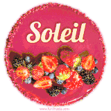 Beautifully decorated red velvet berry birthday cake with vibrant fruits and a glowing 'Soleil' name, adding a touch of sweetness and sparkle.
