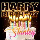 A vibrant animated GIF featuring a delicious birthday cake topped with glowing candles and the name 'Stanley' in elegant script, and the words 'Happy Birthday' on the black background.