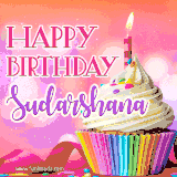 A vibrant birthday GIF featuring a rainbow-colored cupcake topped with white frosting, sprinkles, and a lit candle. The text reads 'Happy Birthday Sudarshana' in bold pink and violet letters with white outline.