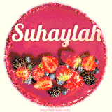 Beautifully decorated red velvet berry birthday cake with vibrant fruits and a glowing 'Suhaylah' name, adding a touch of sweetness and sparkle.
