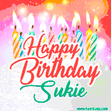 Bright birthday candles with rainbow flames on a cake, alongside the text 'Happy Birthday Sukie' in vibrant script in this celebratory animated GIF.