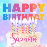 A vibrant animated name GIF with the words 'Happy Birthday Suzana' with colorful candles on a creamy cake. The background sparkles with pastel shades, adding a festive touch.