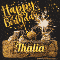 Celebrate Thalia's birthday with a GIF featuring chocolate cake, a lit sparkler, and golden stars