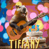 Animated birthday GIF showing a capybara playing guitar and singing beside a birthday cake with the name Tiffany in large letters and colorful bokeh lights in the background.