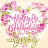 A stunning heart made of pink roses surrounds the elegant script text 'Happy Birthday Tigerlily' on a soft beige background. Animated sparkles add a magical and festive feel.