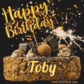 Celebrate Toby's birthday with a GIF featuring chocolate cake, a lit sparkler, and golden stars