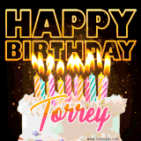 A vibrant animated GIF featuring a delicious birthday cake topped with glowing candles and the name 'Torrey' in elegant script, and the words 'Happy Birthday' on the black background.