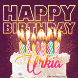 A colorful birthday cake topped with lit candles, with the words 'Happy Birthday Urkia' in bold glowing letters on a burgundy background. Animated flames add a festive touch.