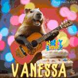 Animated birthday GIF showing a capybara playing guitar and singing beside a birthday cake with the name Vanessa in large letters and colorful bokeh lights in the background.
