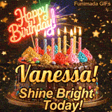 Festive chocolate cake GIF with the name Vanessa! written on the dark glaze under flickering candles.