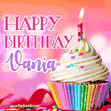 A vibrant birthday GIF featuring a rainbow-colored cupcake topped with white frosting, sprinkles, and a lit candle. The text reads 'Happy Birthday Vania' in bold pink and violet letters with white outline.