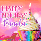 A vibrant birthday GIF featuring a rainbow-colored cupcake topped with white frosting, sprinkles, and a lit candle. The text reads 'Happy Birthday Vanida' in bold pink and violet letters with white outline.