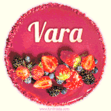 Beautifully decorated red velvet berry birthday cake with vibrant fruits and a glowing 'Vara' name, adding a touch of sweetness and sparkle.