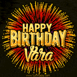 Golden 'Happy Birthday Vara' text accompanied by animated rainbow fireworks for a festive animated greeting.