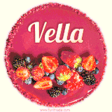 Beautifully decorated red velvet berry birthday cake with vibrant fruits and a glowing 'Vella' name, adding a touch of sweetness and sparkle.