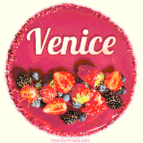 Beautifully decorated red velvet berry birthday cake with vibrant fruits and a glowing 'Venice' name, adding a touch of sweetness and sparkle.