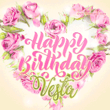 A stunning heart made of pink roses surrounds the elegant script text 'Happy Birthday Vesta' on a soft beige background. Animated sparkles add a magical and festive feel.