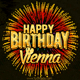 Golden 'Happy Birthday Vienna' text accompanied by animated rainbow fireworks for a festive animated greeting.