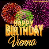 A golden 'Happy Birthday Vienna' message with vibrant fireworks in the background, creating a festive and celebratory vibe in this animated name GIF.