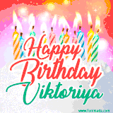 Bright birthday candles with rainbow flames on a cake, alongside the text 'Happy Birthday Viktoriya' in vibrant script in this celebratory animated GIF.