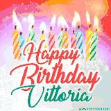 Bright birthday candles with rainbow flames on a cake, alongside the text 'Happy Birthday Vittoria' in vibrant script in this celebratory animated GIF.