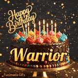 Chocolate cake with colorful icing swirls on top and the name Warrior written on the chocolate frosting under lit candles.