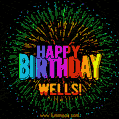 A colorful animated GIF featuring the text 'Happy Birthday Wells!' in rainbow colors with a dynamic iridescent firework display in the background.