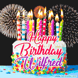 A lively happy birthday animated GIF showcasing a colorful birthday cake covered in sprinkles, topped with glowing candles, and surrounded by vibrant fireworks. The name 'Wilfred' is featured in elegant script.