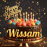 Yellow script spelling the name Wissam on a classic chocolate cake with a dark glaze under warm candlelight.