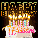 A vibrant animated GIF featuring a delicious birthday cake topped with glowing candles and the name 'Wissam' in elegant script, and the words 'Happy Birthday' on the black background.