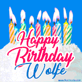 A cheerful animated GIF featuring colorful lit birthday candles on a white cake, with the text 'Happy Birthday Wolfe' in bold red and blue script on a bright blue background.