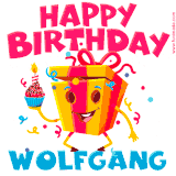 A funny animated birthday GIF with the words 'Happy Birthday Wolfganga', colorful gift box with arms and legs, holding a cupcake with a lit candle  with confetti everywhere.